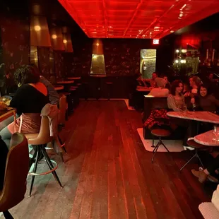 a group of people sitting at tables