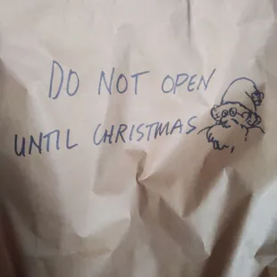a paper bag with a message on it