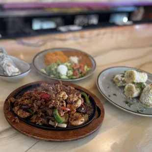 three plates of food on a table