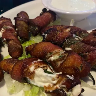 Bacon wrapped jalapeño stuffed w/ cream cheese