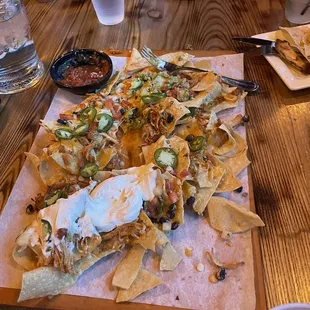 nachos on a cutting board