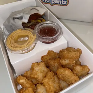 a box of chicken nuggies and dipping sauce