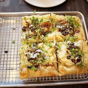Pear Pizza. Topping: Pear, blue cheese, arugula and balsamic drizzle