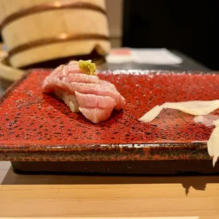 a close up of a plate of sushi