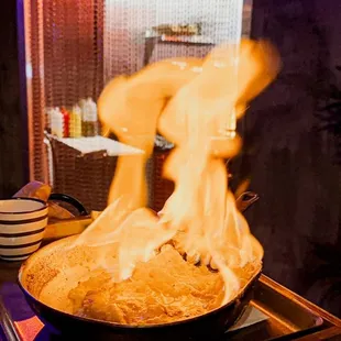 a skillet on fire