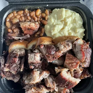 Rib Rib-Tip Plate with potato salad and baked beans