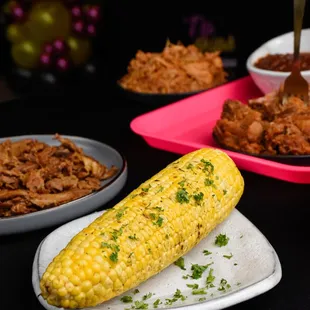 a corn cob on a plate