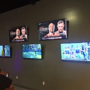 Lounge area for adults to sit, eat, drink and  relax while being able to watch their favorite athlete or team win while the kids play!