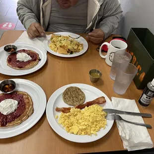 Bf ordered chilaquiles and I ordered Raspberry Pancake combo. I told the waitress to put the pancakes in 2 plates. 1/2 my egg to Bf.