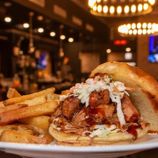 BBQ Jackfruit Sandwich - caramelized jackfruit, cashew pear slaw, lemon pepper fries