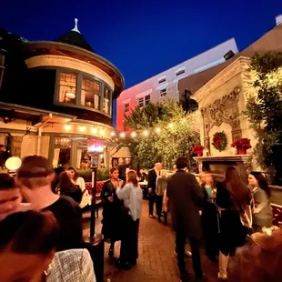 a crowd of people at a party