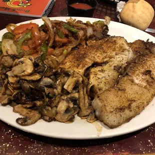 Blackened tilapia with mushrooms and veggies.