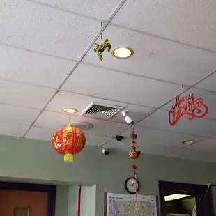 chinese decorations hanging from the ceiling