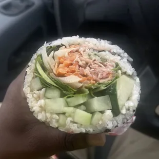 Build your own burrito  with marinated tuna, krab, cucumbers, carrots, avocado, lettuce, masago  and spicy Mayo.