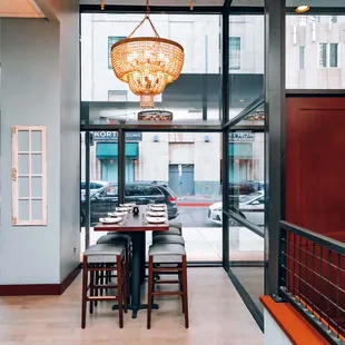 a dining room with a view of the street