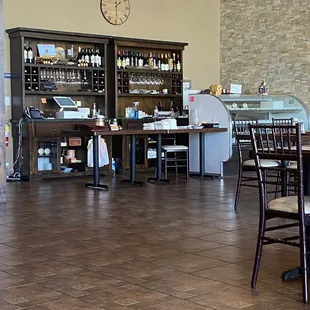 Cash register, wine set up and bakery items