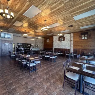 Inside dining room from entrance. Notice wood paneling and windows to resemble Noah's Ark