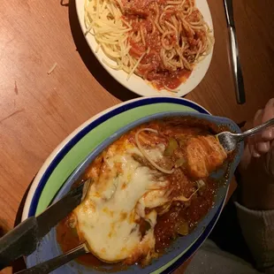 Chicken parmigiana with a side of spaghetti