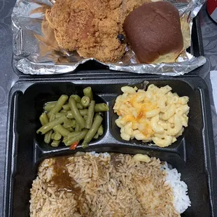 Pork chop lunch plate + macncheese +green beans + rice &amp; gravy