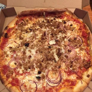 Large sausage and onion pizza