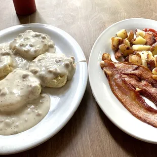 2 biscuits+gravy, side of bacon and po-tay-toes.
