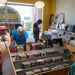 Nob Hill Music customers perusing CD sales items