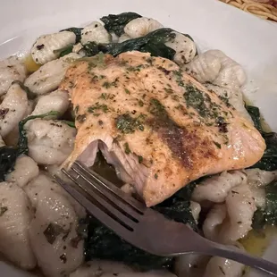 Salmon and spinach over homemade gnocchi