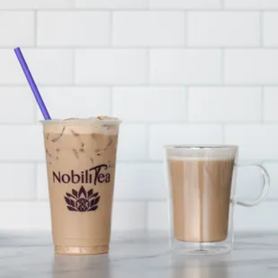 a glass of iced coffee next to a glass of iced coffee