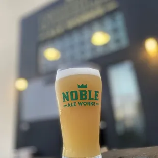 a glass of beer on a table