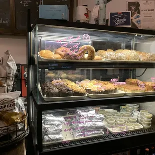 Bagels, muffins, and other food items.