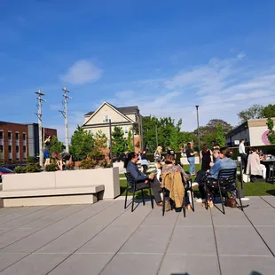 a group of people sitting around a table