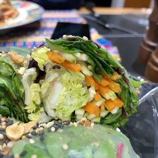 a salad wrapped in lettuce and vegetables