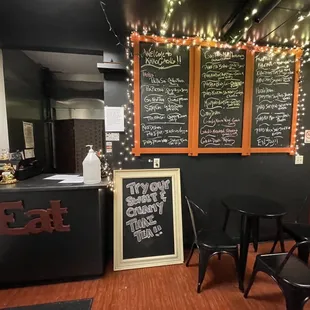 a chalkboard menu on the wall