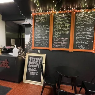 a chalkboard menu on the wall