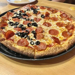 Half olives, half pepperoni