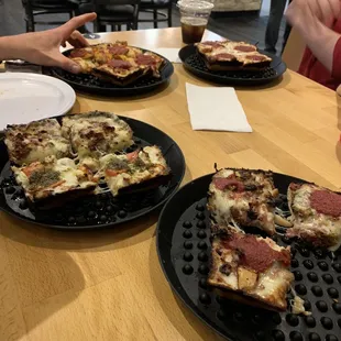 Many single serving pizzas.