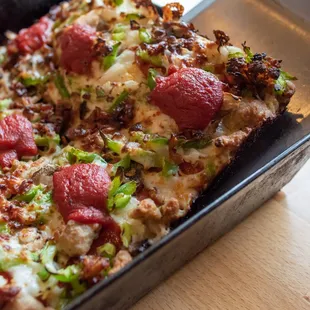 a close up of a pizza