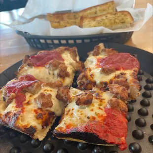 Sausage Deep Dish with garlic bread!