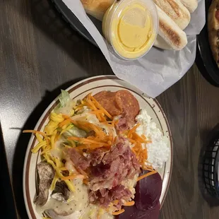 Salad bar and breadsticks