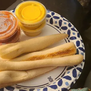 Part of a family order of breadsticks. Marinara sauce and spicy cheese dip. Excellent!