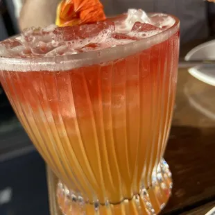 a cocktail in a glass on a table