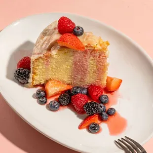 olive oil cake with mixed berry compote, thai basil + lemon glaze