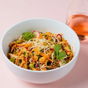 Try our new Thai Noodle Salad! Loaded with springy rice noodles, fresh crunchy veggies and our g-chicken!