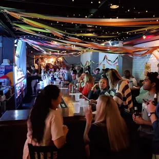 people sitting at the bar