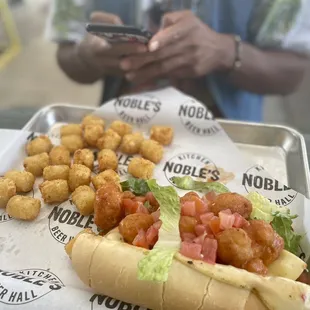 Buffalo Cauliflower Sub w| Crispy Tater Tots  - Really good!