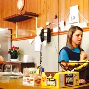 One Waitress who is also the Cashier and Bouncer!