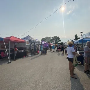 a crowd of people shopping
