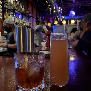 a drink and a beverage on a bar