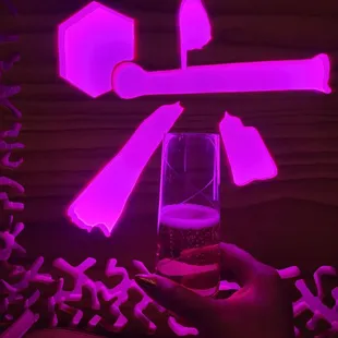 a person holding a glass of wine