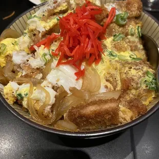 This is the Pork Katsu Don with rice, onions, and egg.